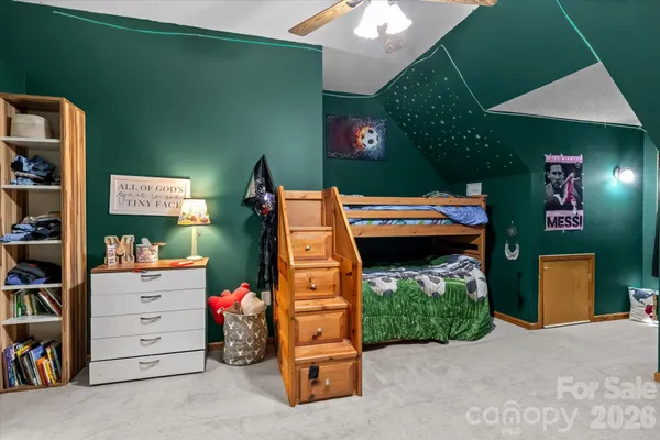 a room with furniture and a lamp