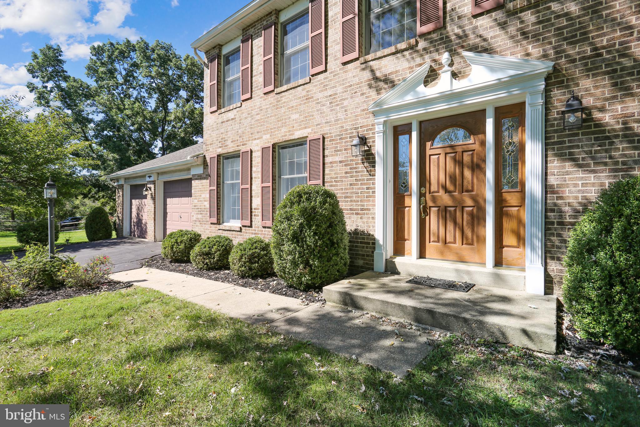 9301 Huntmaster Road Laytonsville, MD 20882 - Photo 10 of 99 Front walkway leads to the front stoop