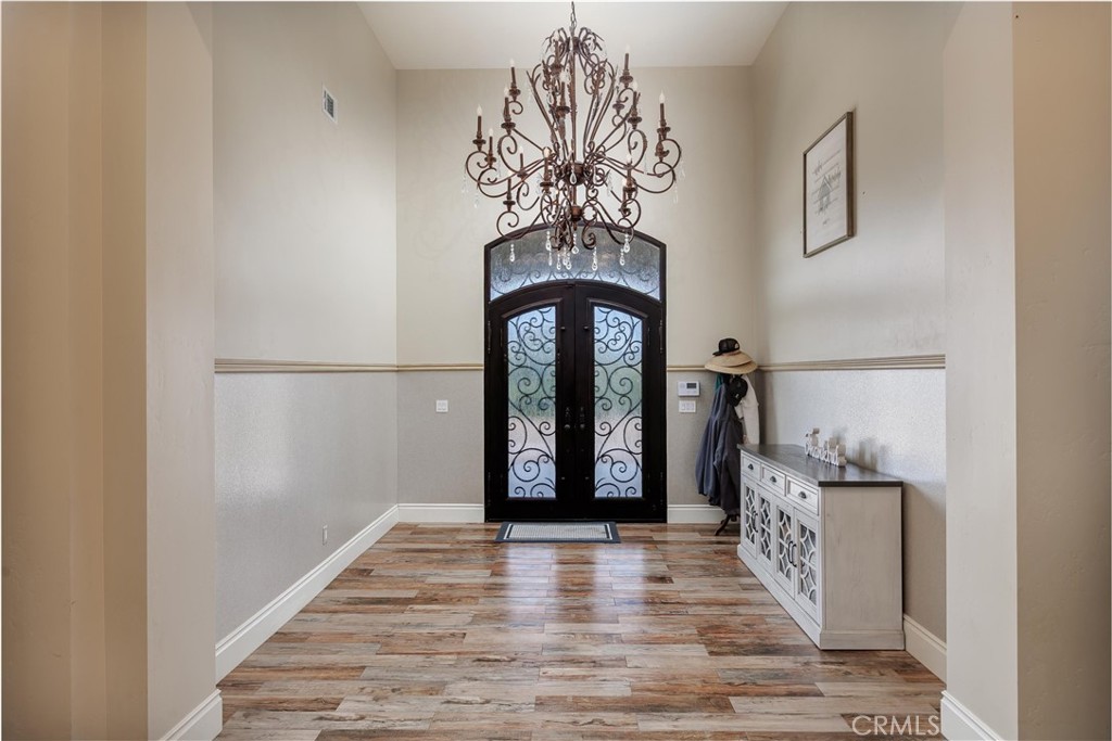 1950 Lemon Ranch Road Arroyo Grande, CA 93420 - Photo 26 of 38 a view of a hallway with wooden floor and cabinet