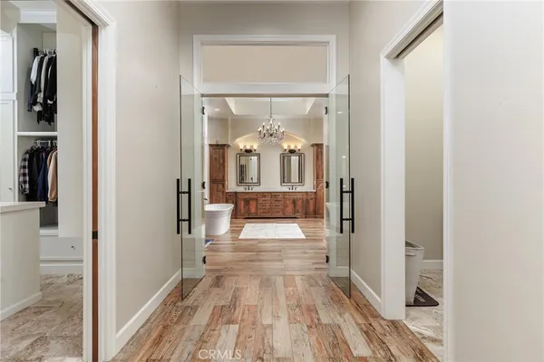 a bedroom with a bed and a mirror