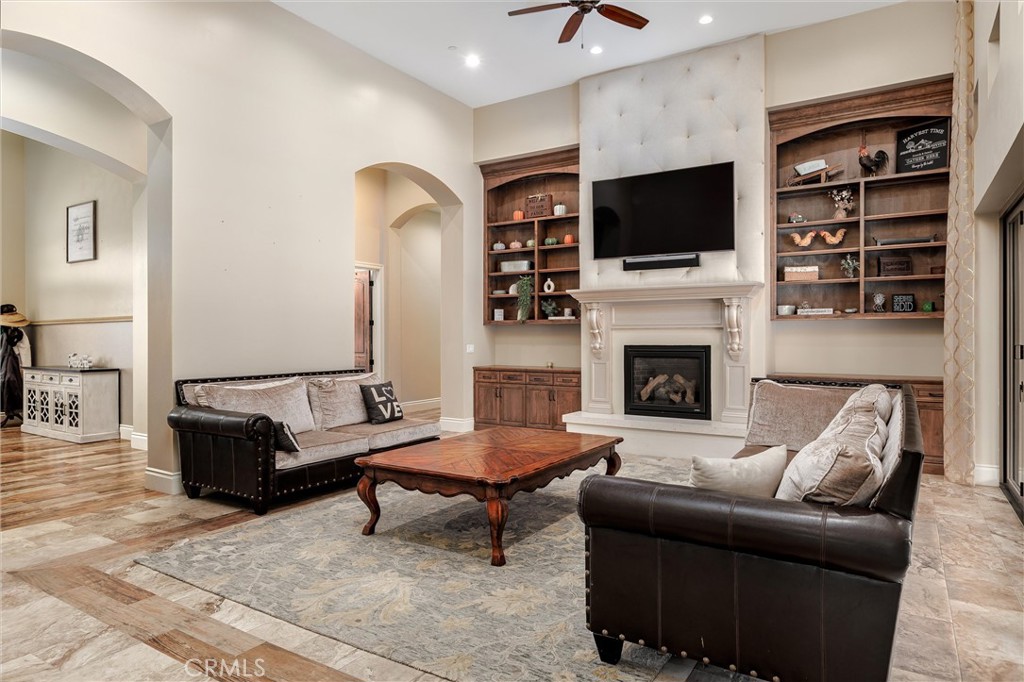 1950 Lemon Ranch Road Arroyo Grande, CA 93420 - Photo 33 of 38 a living room with furniture fireplace and flat screen tv