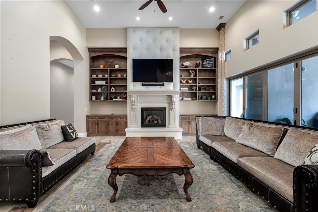 1950 Lemon Ranch Road Arroyo Grande, CA 93420 - Photo 4 of 38 a living room with furniture fireplace and flat screen tv