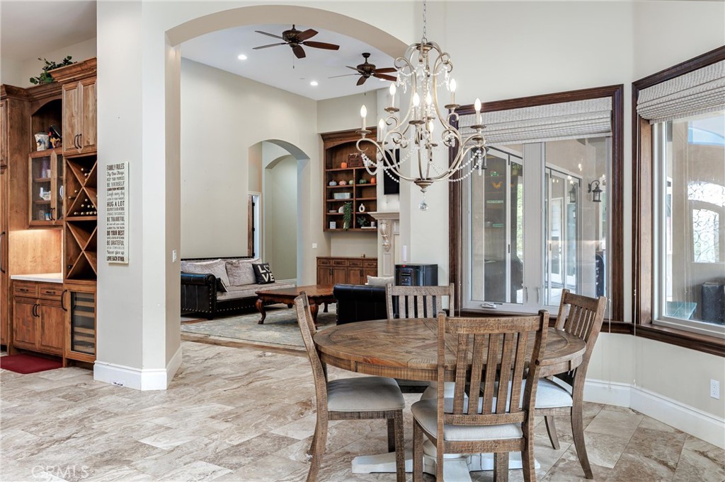 1950 Lemon Ranch Road Arroyo Grande, CA 93420 - Photo 5 of 38 a view of a dining room with furniture and a chandelier