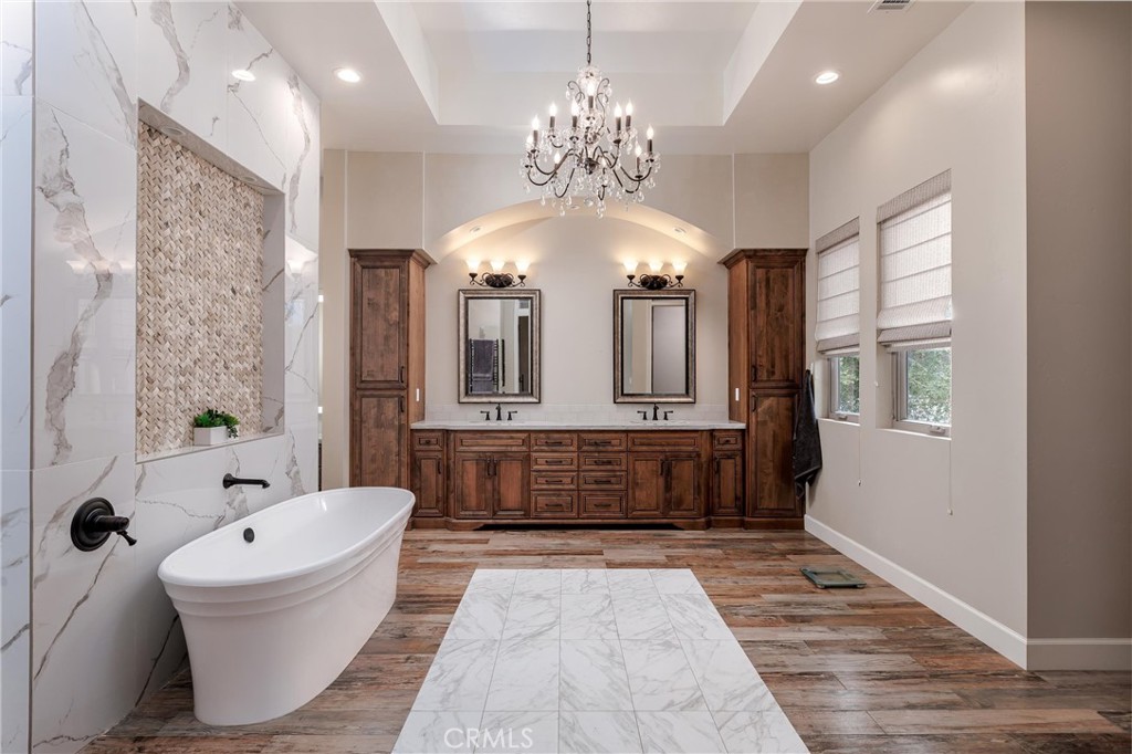 1950 Lemon Ranch Road Arroyo Grande, CA 93420 - Photo 8 of 38 a bathroom with a tub sink shower and mirror