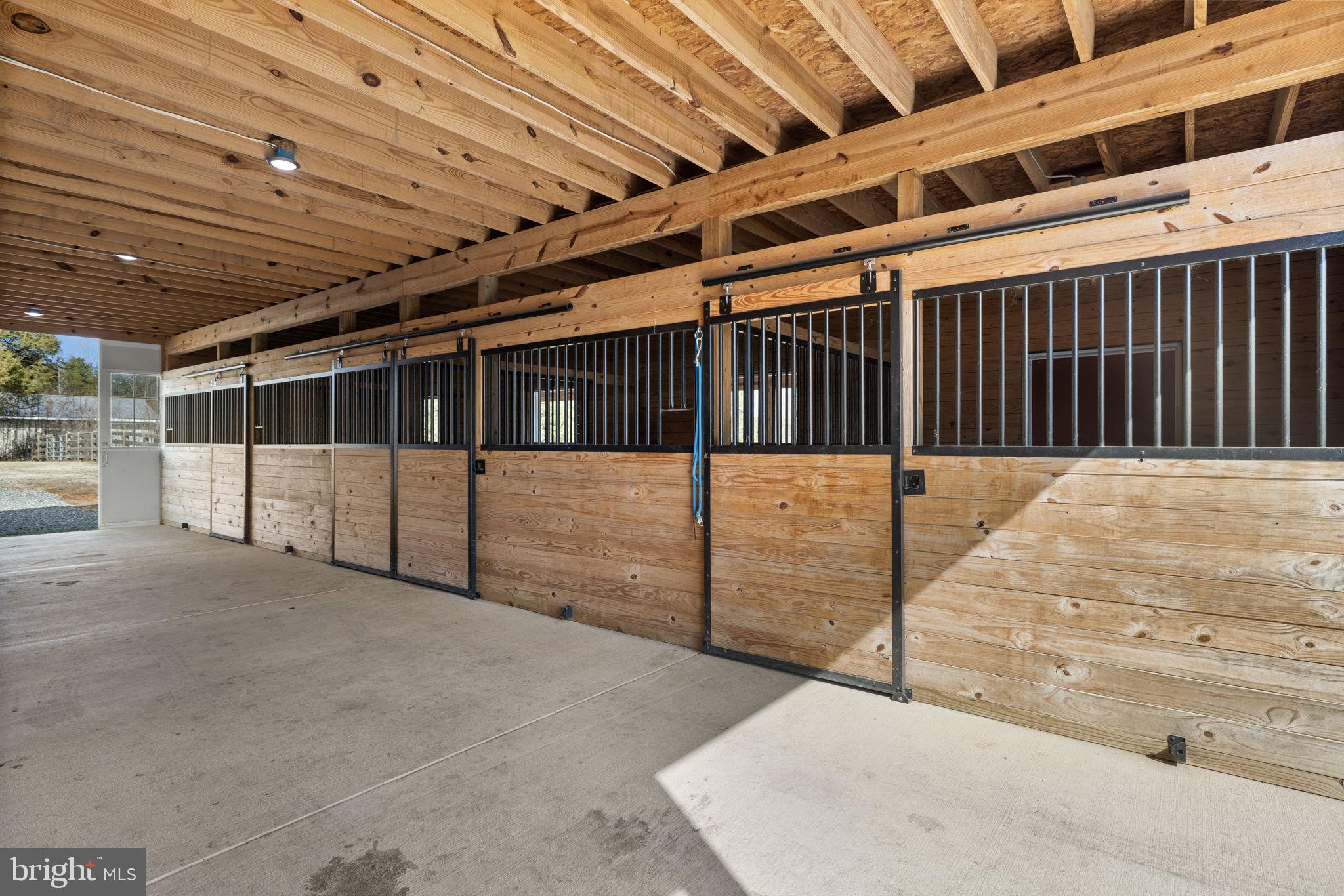 1815 Country Road Beaverdam, VA 23015 - Photo 59 of 98 4 custom stalls with sliding doors