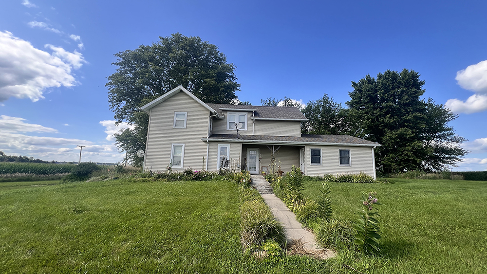14474 Lyndon Road Morrison, IL 61270 - Photo 1 of 31 a front view of a house with a yard
