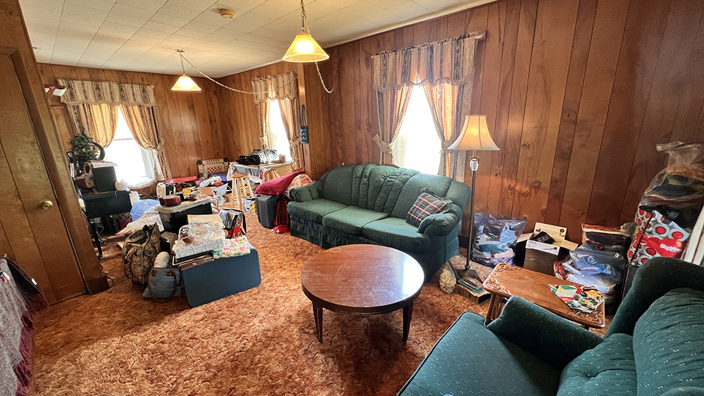 14474 Lyndon Road Morrison, IL 61270 - Photo 21 of 31 a living room with furniture a large window and a sink
