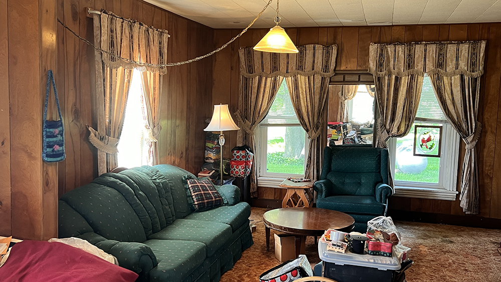 14474 Lyndon Road Morrison, IL 61270 - Photo 22 of 31 a living room with furniture a window and a flat screen tv