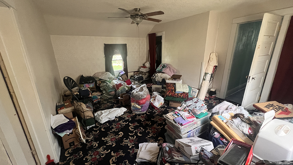 14474 Lyndon Road Morrison, IL 61270 - Photo 24 of 31 a room with furniture a window and a couch