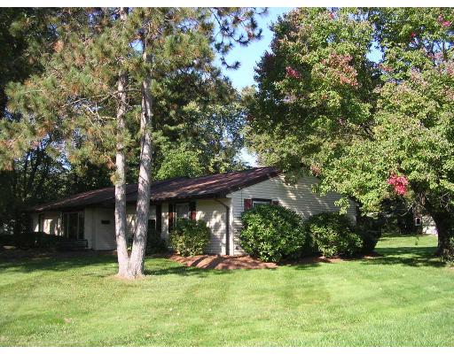 19 Larnis Road Framingham, MA 01701 - Photo 1 of 13 a front view of a house with a yard