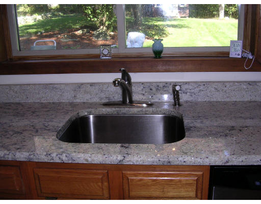 19 Larnis Road Framingham, MA 01701 - Photo 7 of 13 a kitchen with a sink and a window