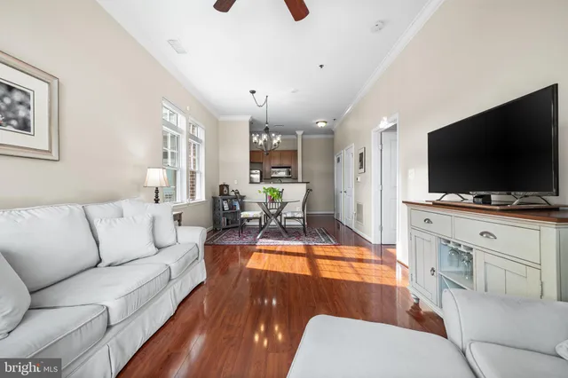 a bedroom with a bed and a night stand