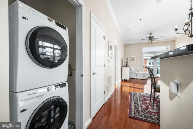 a view of living room with furniture and rug