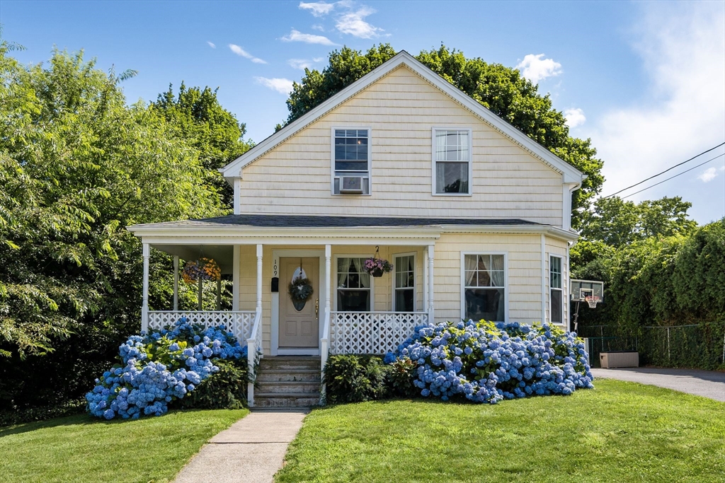 109 Read Street Somerset, MA 02726 - Photo 1 of 42 a front view of a house with a garden