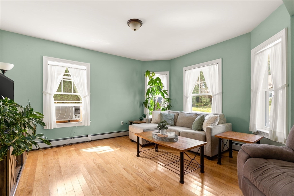 109 Read Street Somerset, MA 02726 - Photo 12 of 42 a living room with furniture and a window