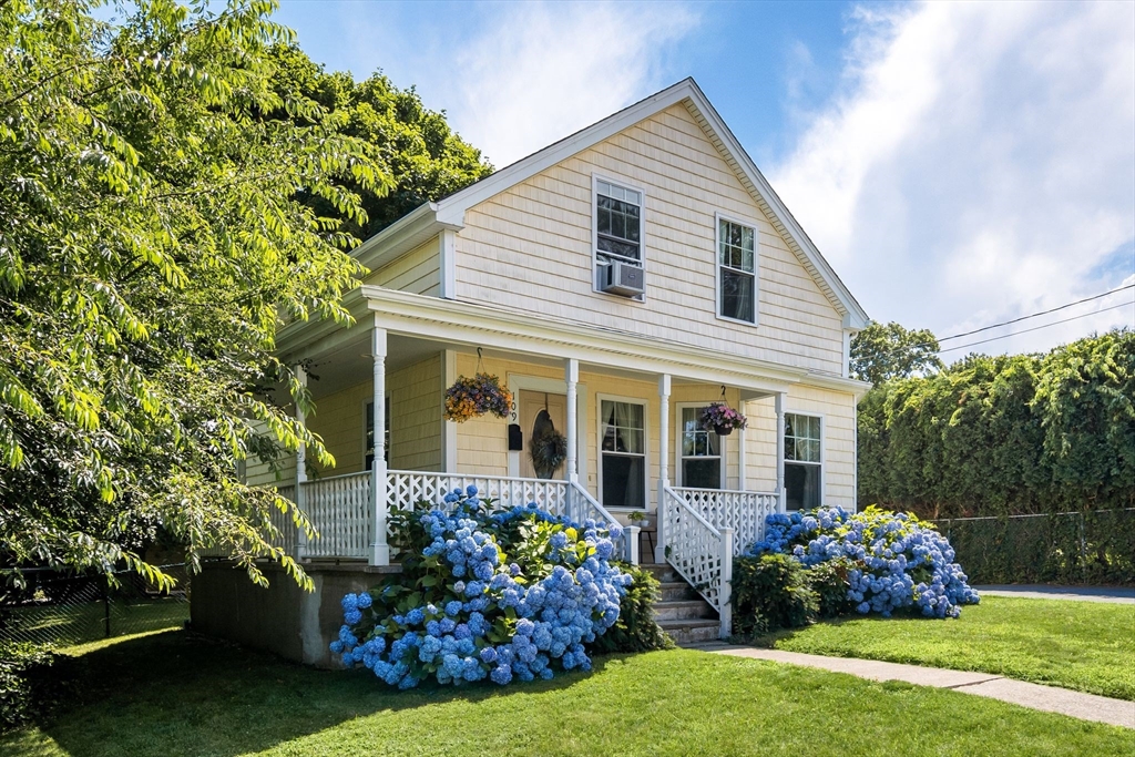 109 Read Street Somerset, MA 02726 - Photo 2 of 42 a front view of house with garden