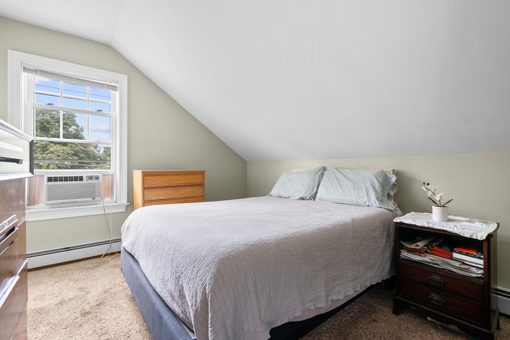 109 Read Street Somerset, MA 02726 - Photo 28 of 42 a bedroom with a bed and a window