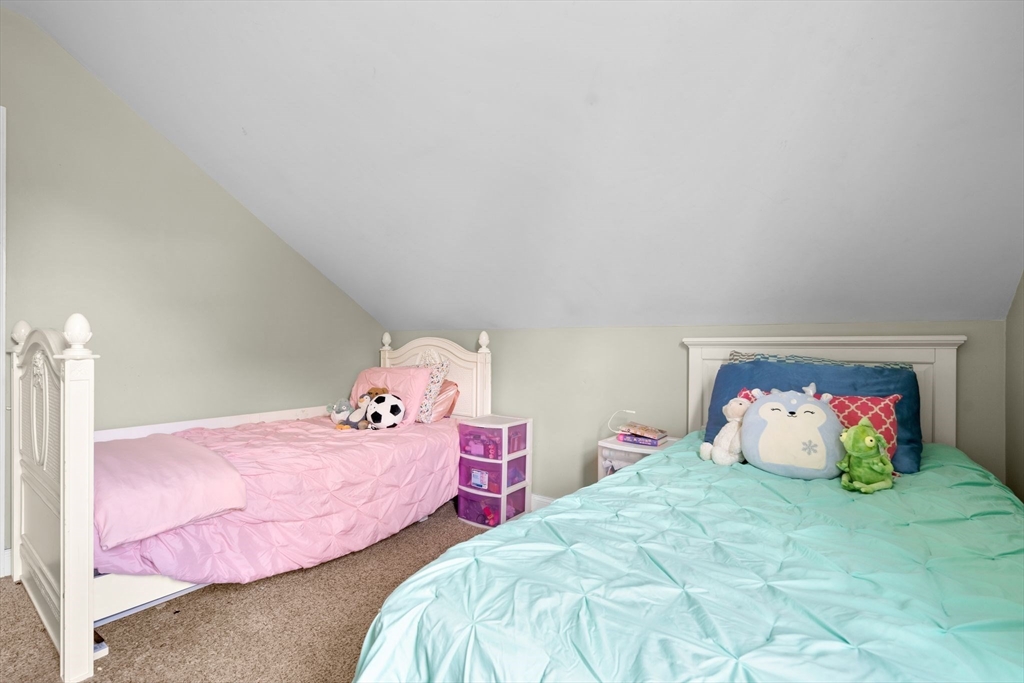 109 Read Street Somerset, MA 02726 - Photo 32 of 42 a bedroom with pink bed and closet