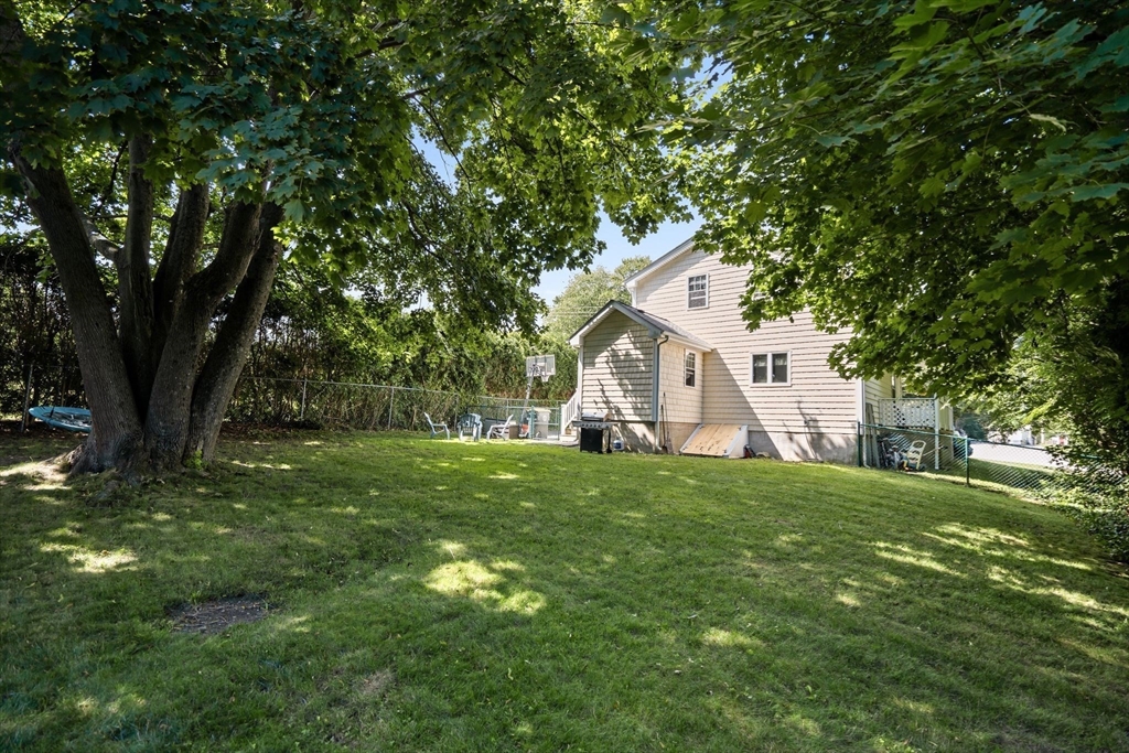 109 Read Street Somerset, MA 02726 - Photo 38 of 42 a front view of a house with a yard
