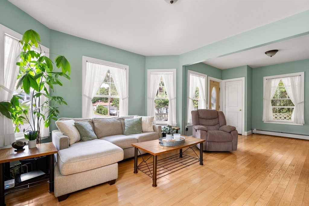 109 Read Street Somerset, MA 02726 - Photo 10 of 42 a living room with furniture and a potted plant