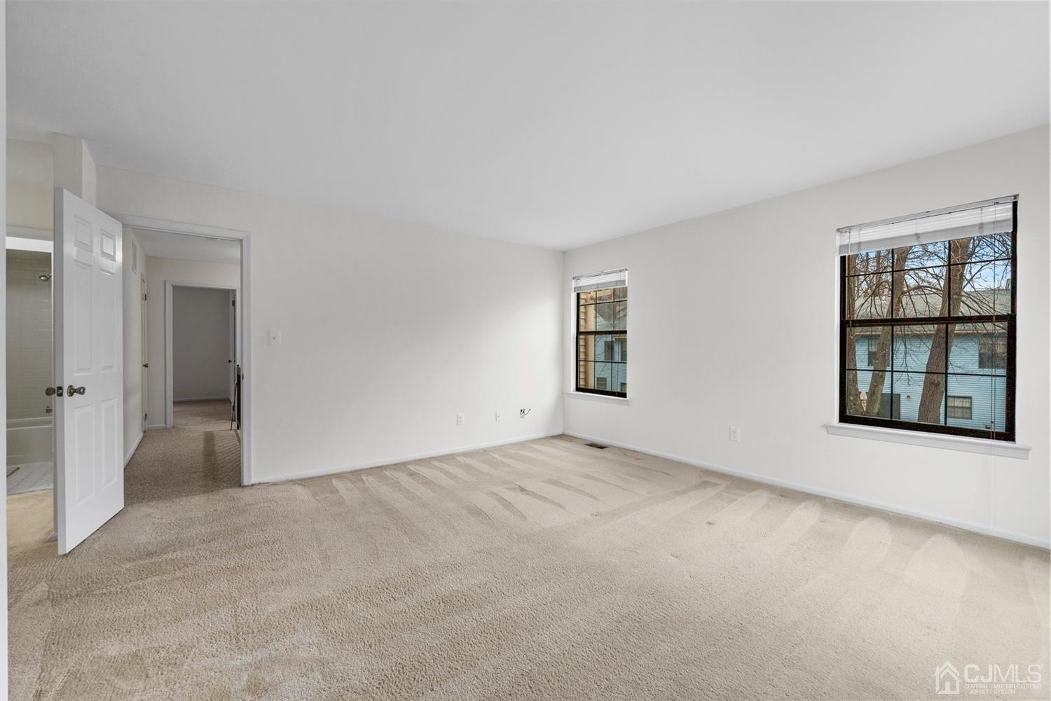 3708 Cricket Circle Edison, NJ 08820 - Photo 21 of 40 an empty room with windows and closet