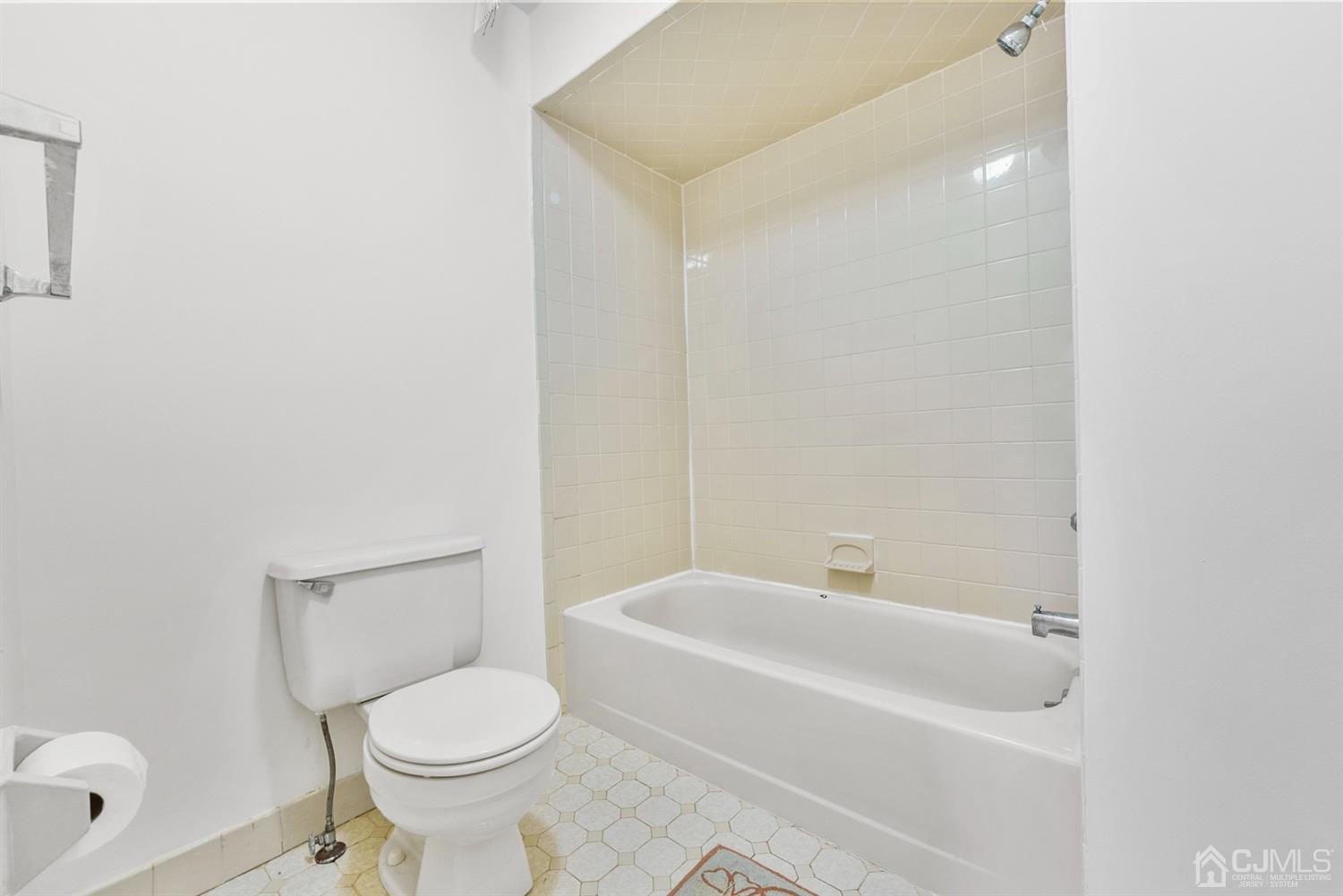 3708 Cricket Circle Edison, NJ 08820 - Photo 26 of 40 a white toilet sitting next to a bath tub