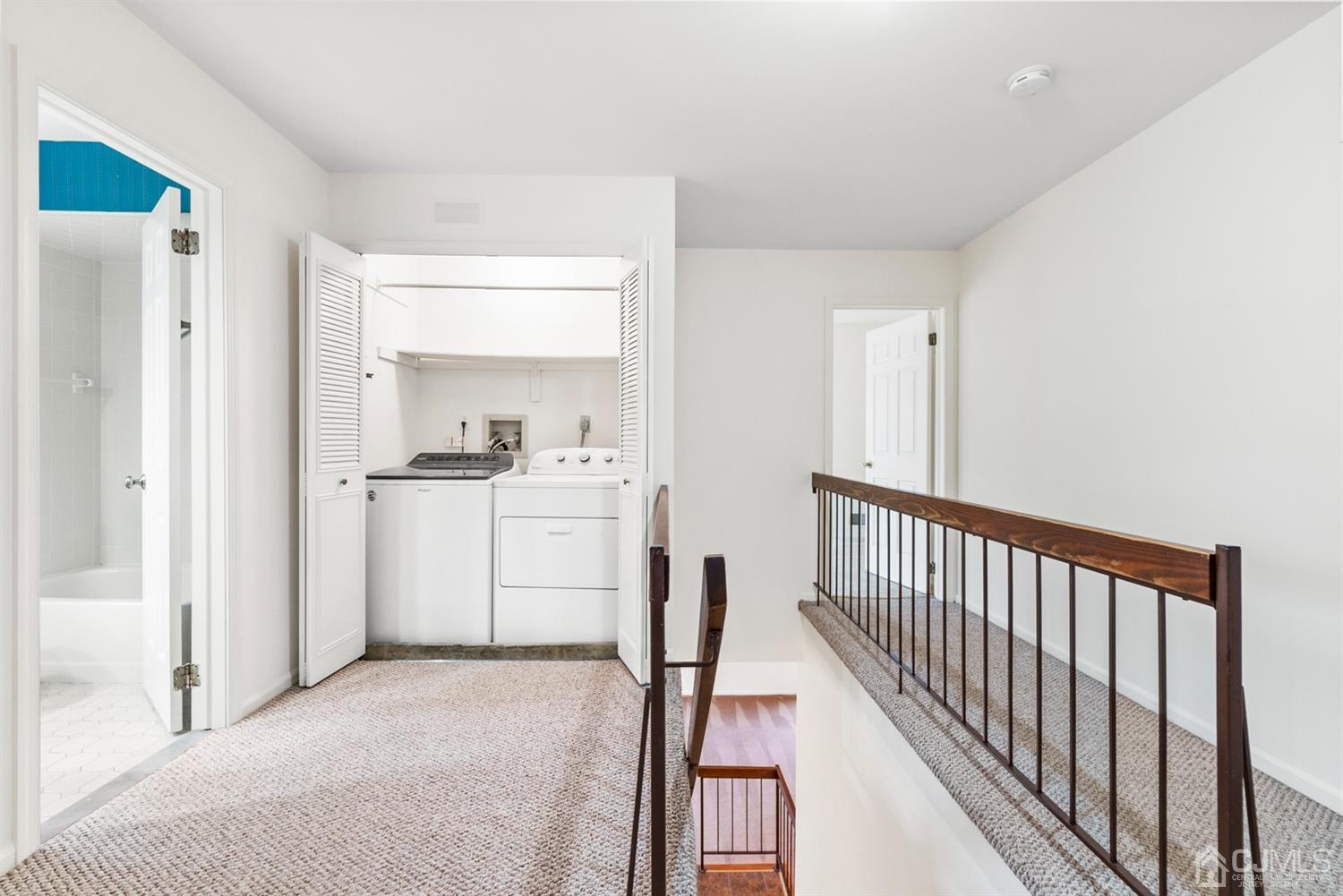 3708 Cricket Circle Edison, NJ 08820 - Photo 32 of 40 a view of hallway with cabinets and a refrigerator