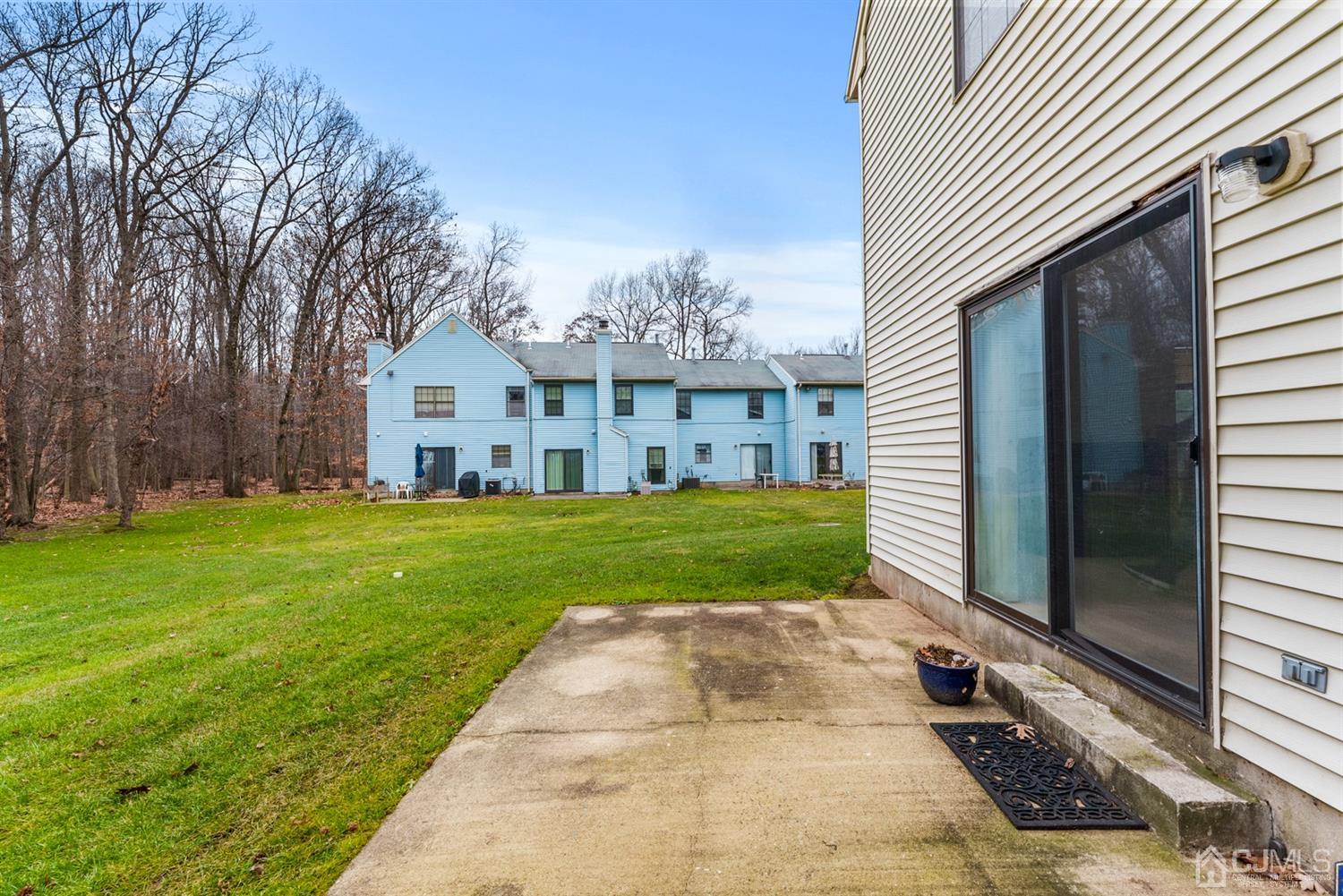 3708 Cricket Circle Edison, NJ 08820 - Photo 34 of 40 a view of house that has a yard