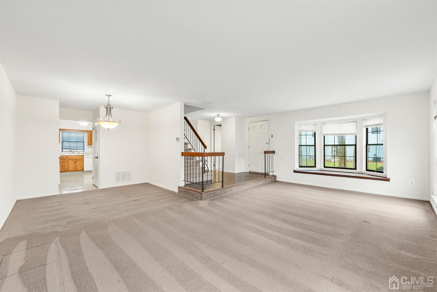 3708 Cricket Circle Edison, NJ 08820 - Photo 6 of 40 a view of an empty room with a window