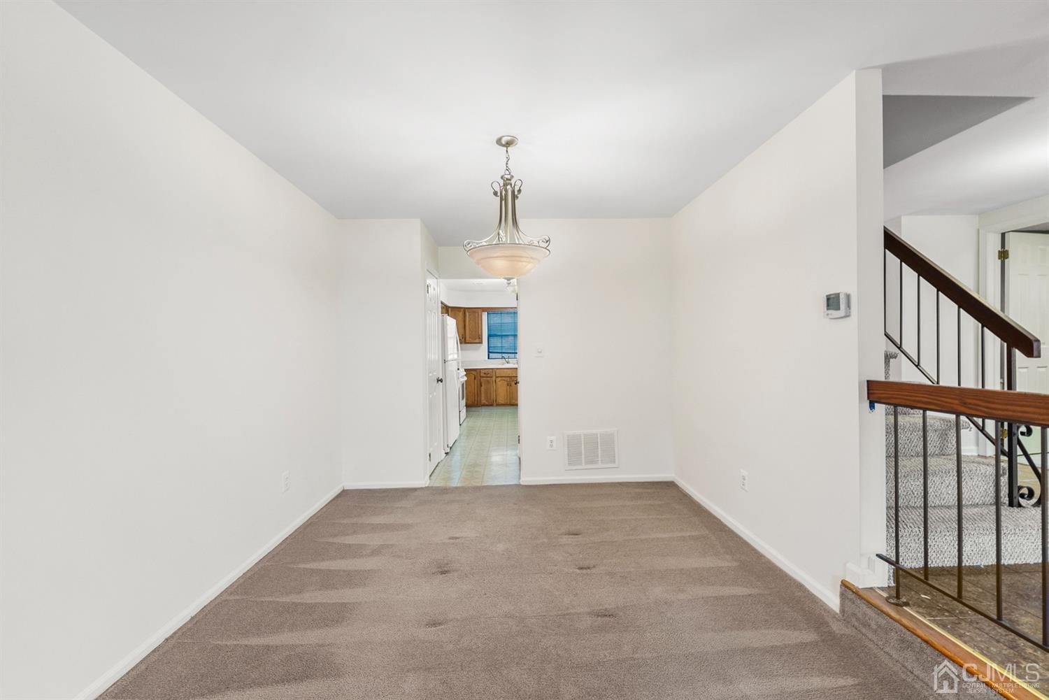 3708 Cricket Circle Edison, NJ 08820 - Photo 9 of 40 a view of empty room with wooden floor