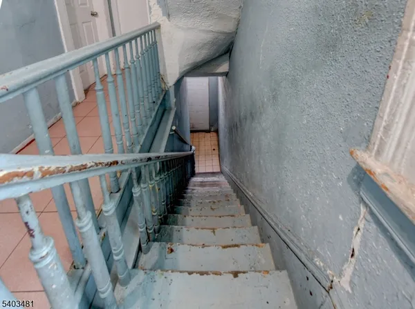 a view of hallway with windows