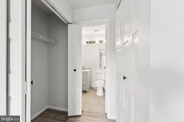 a view of a bathroom with a toilet