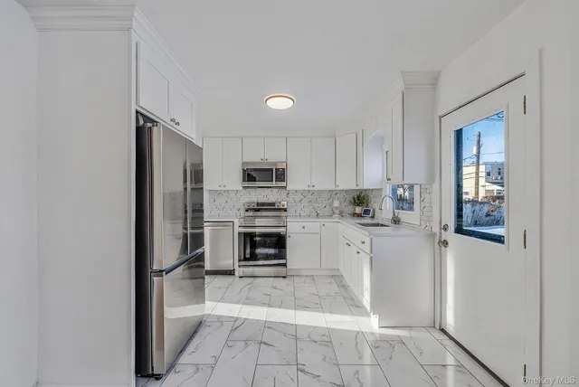 $769,000 | 59 Ford Drive West, Massapequa, NY 11758