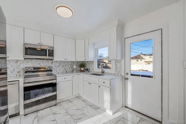 $769,000 | 59 Ford Drive West, Massapequa, NY 11758