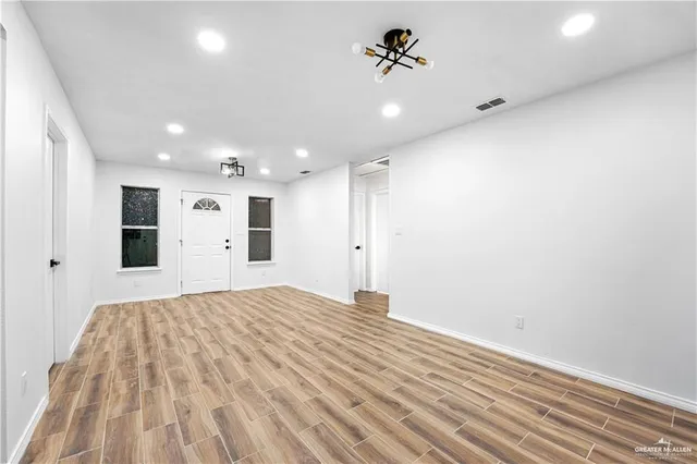 a view of room with a ceiling fan
