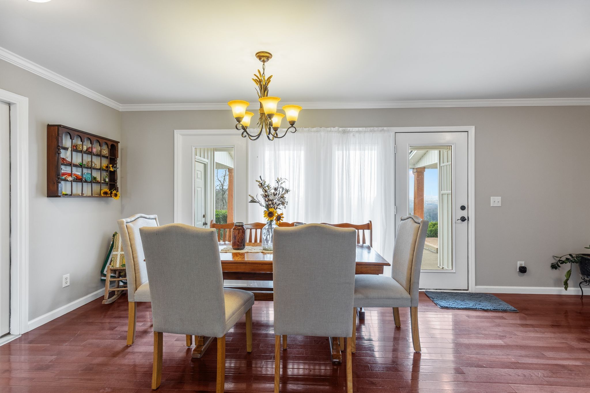 881 Mt Olivet Road Columbia, TN 38401 - Photo 23 of 68 a view of a dining room with furniture wooden floor and chandelier