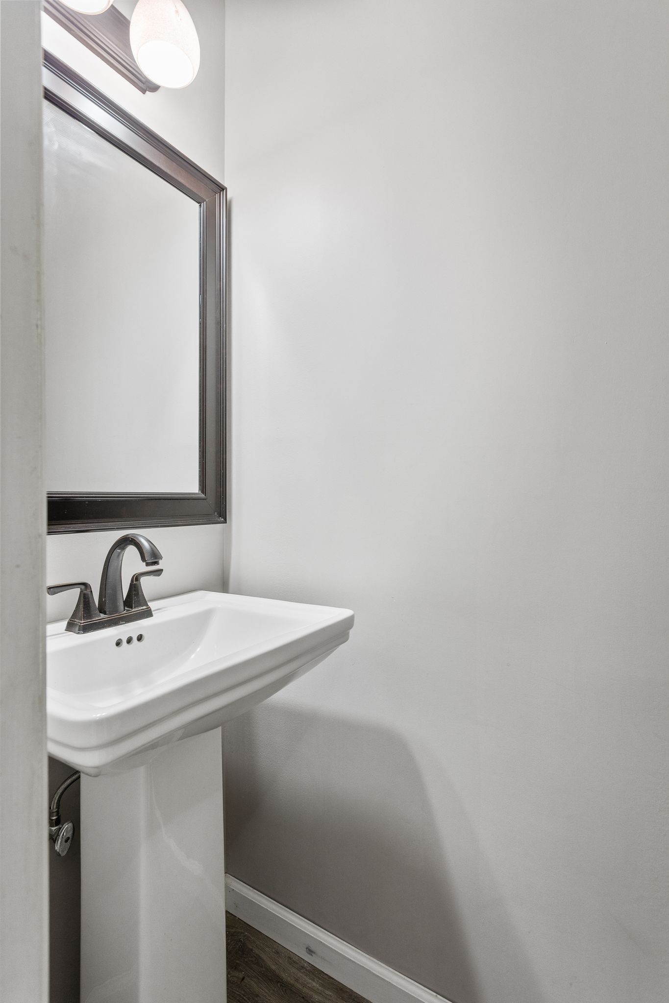 881 Mt Olivet Road Columbia, TN 38401 - Photo 36 of 68 a bathroom with a sink a mirror and a toilet