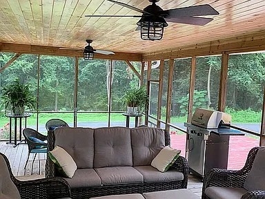 881 Mt Olivet Road Columbia, TN 38401 - Photo 65 of 68 a view of a patio with couches chairs dining table and chairs