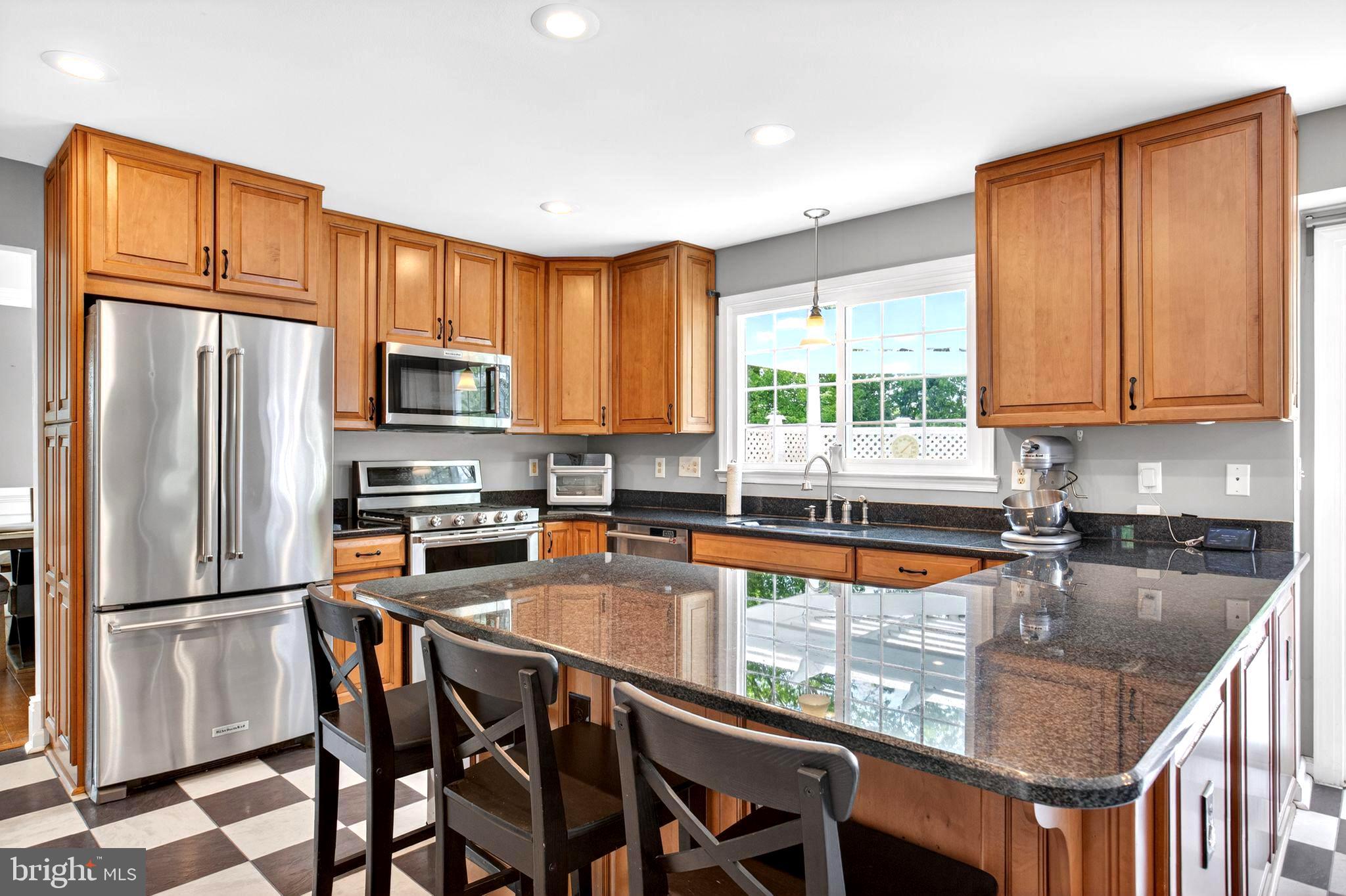 8084 Station Road Manassas, VA 20111 - Photo 16 of 55 Modern kitchen features granite c-tops and island