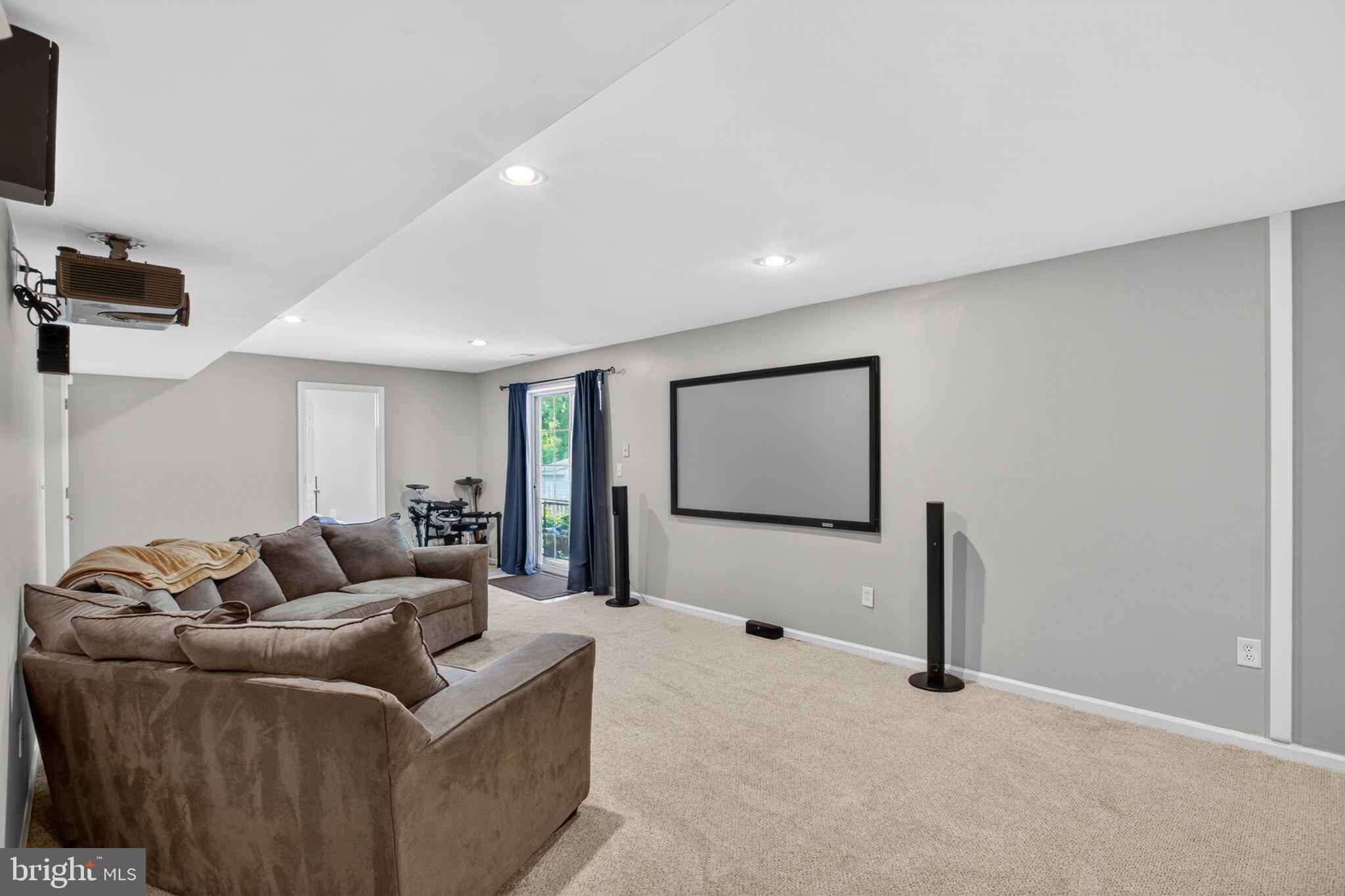 8084 Station Road Manassas, VA 20111 - Photo 35 of 55 LL Family room, recessed lighting, SD to patio