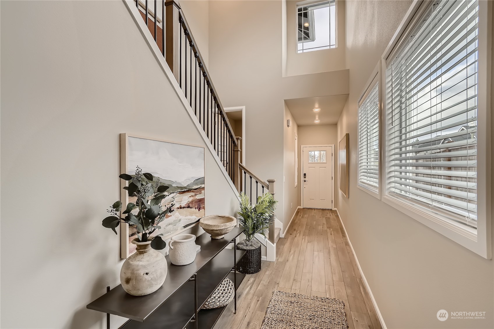 21029 42nd Avenue Southeast, Unit 116 Bothell, WA 98021 - Photo 2 of 22 a view of entryway with wooden floor