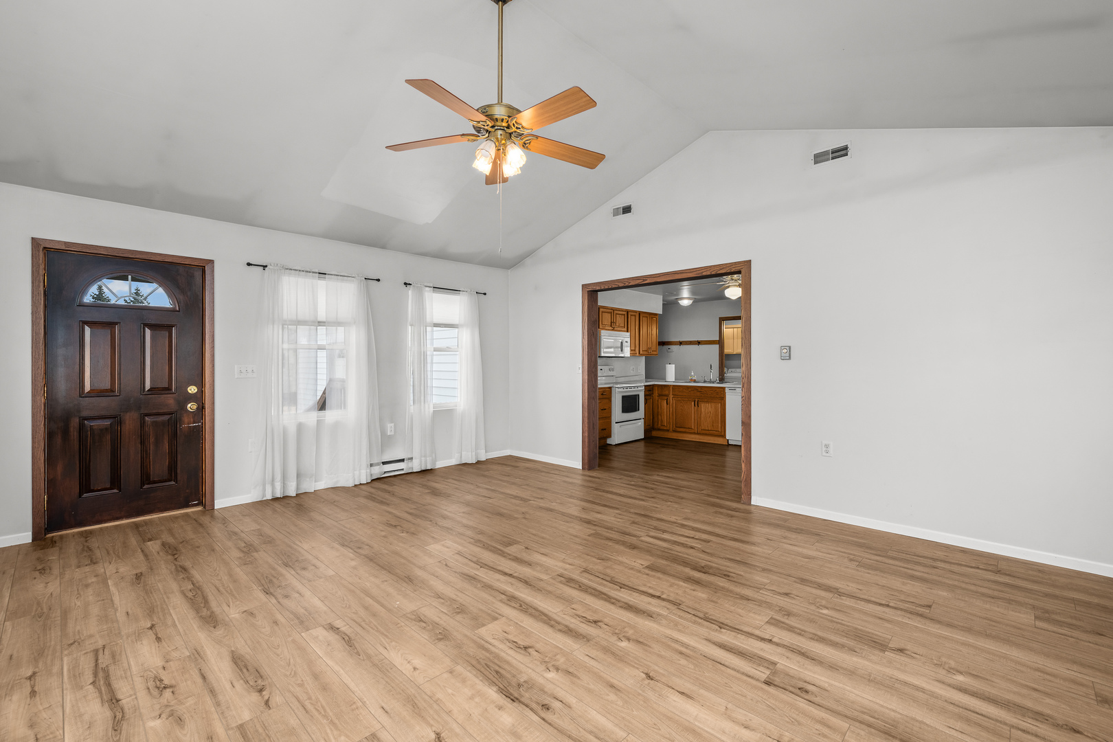 236 West Church Street Kewanee, IL 61443 - Photo 12 of 22 an empty room with wooden floor closet and ceiling fan