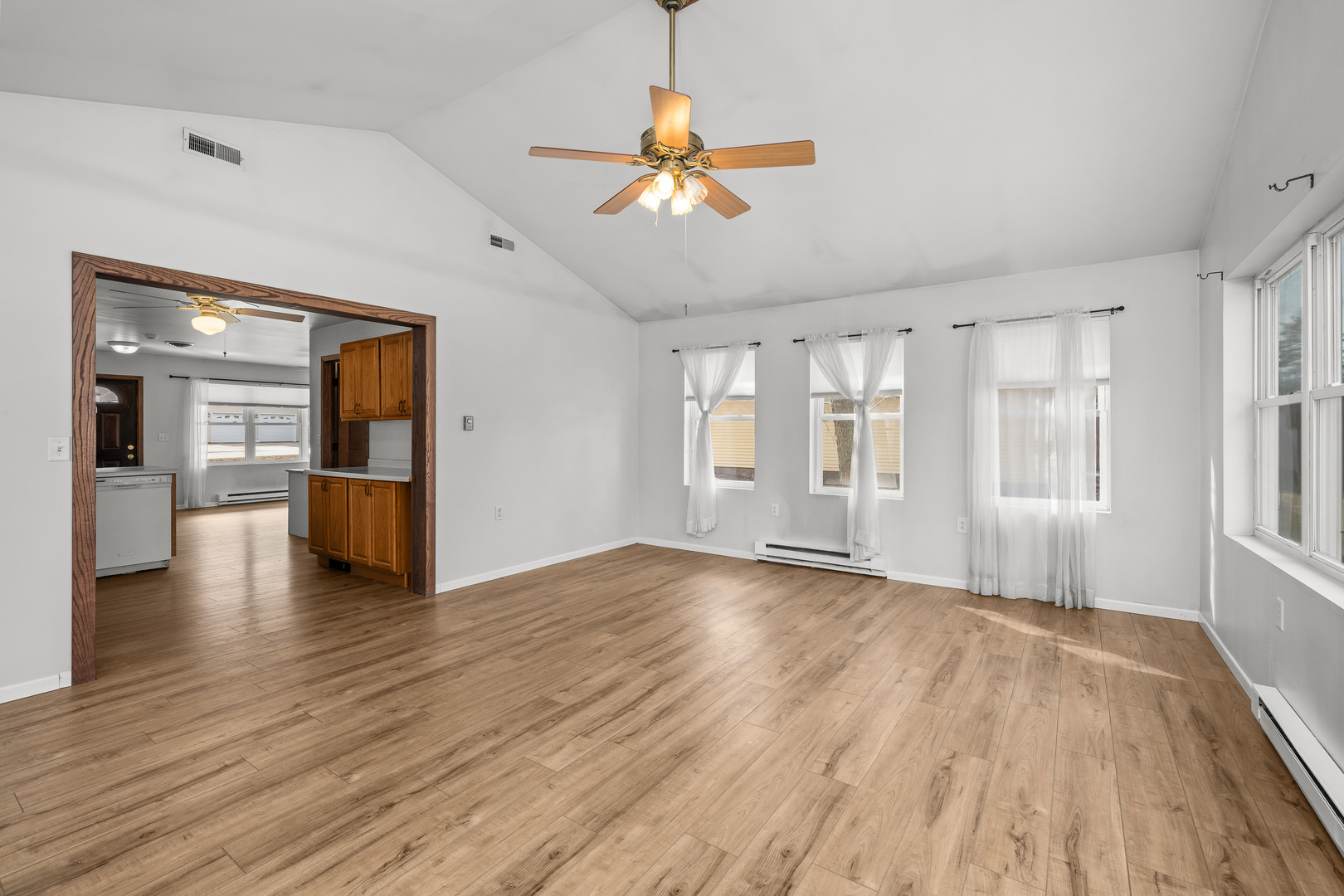 236 West Church Street Kewanee, IL 61443 - Photo 13 of 22 a view of empty room with wooden floor and fan