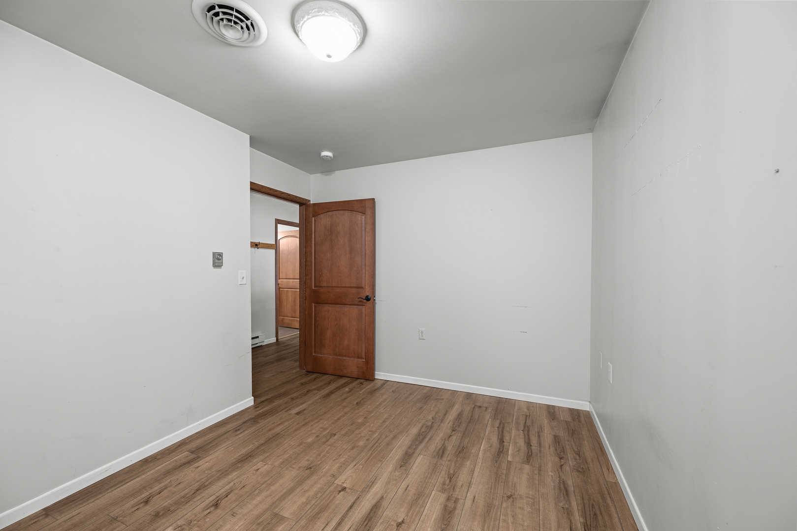 236 West Church Street Kewanee, IL 61443 - Photo 16 of 22 a view of hallway with wooden floor