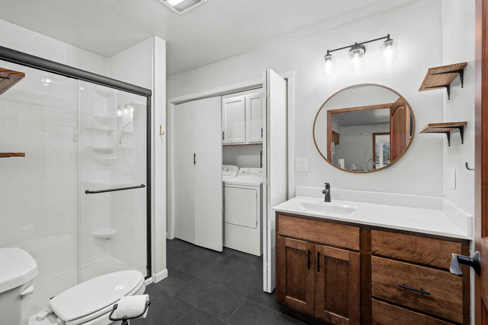 236 West Church Street Kewanee, IL 61443 - Photo 17 of 22 a bathroom with a double vanity sink mirror and toilet