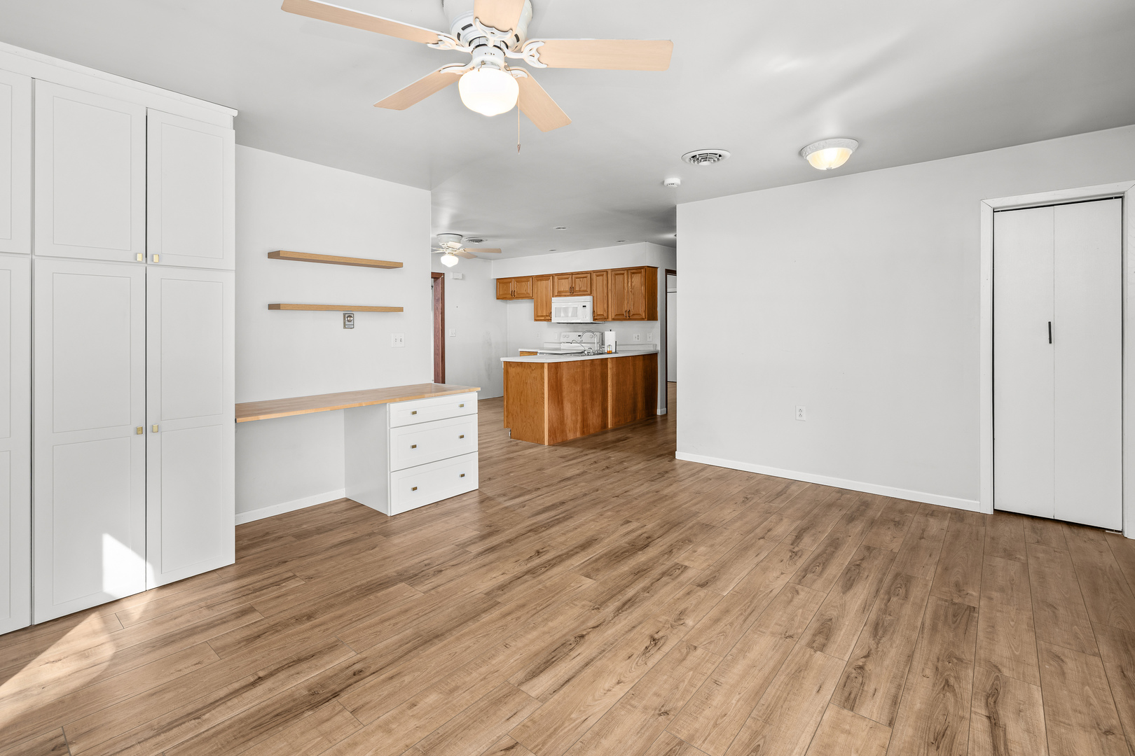 236 West Church Street Kewanee, IL 61443 - Photo 6 of 22 wooden floor in an empty room with a window