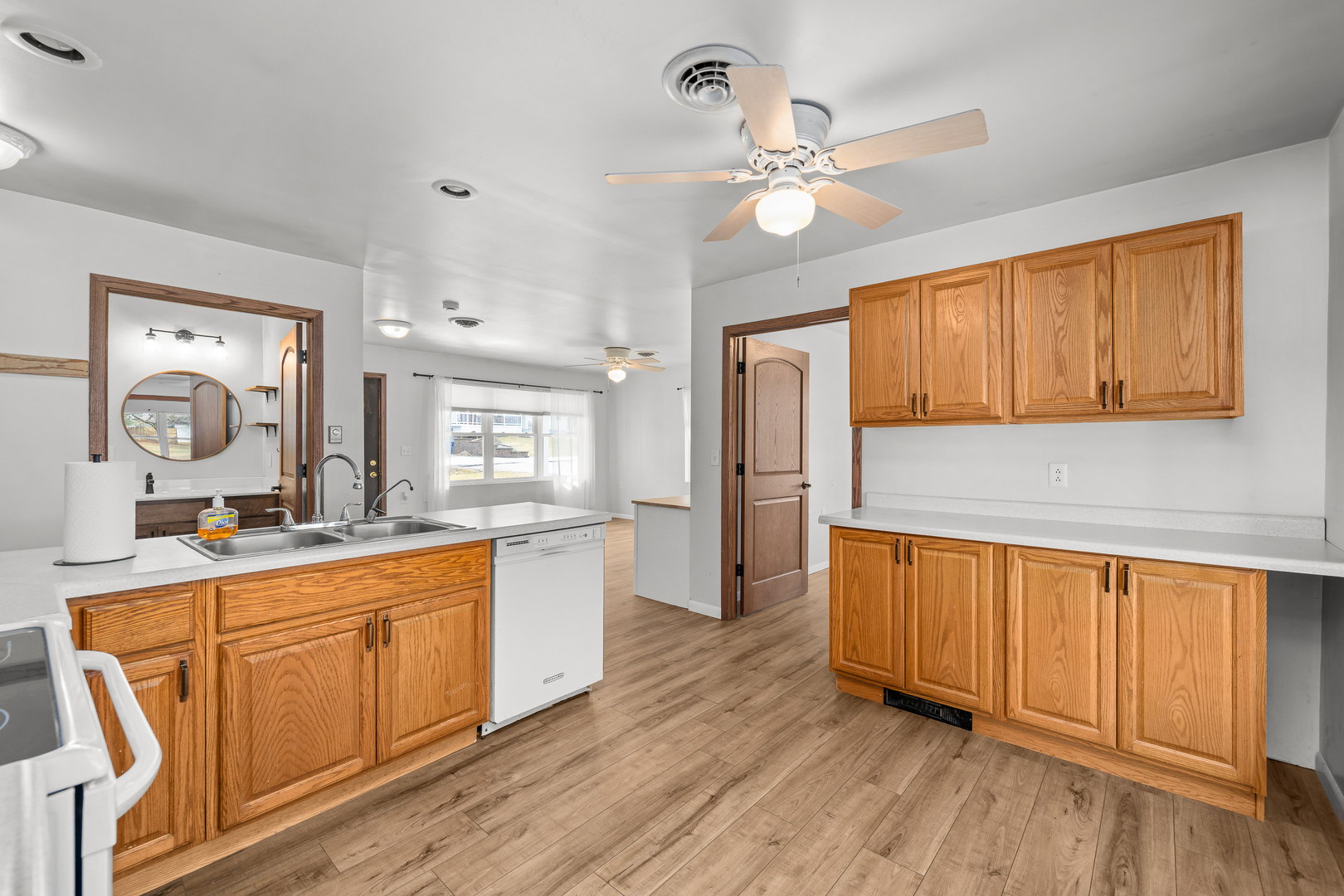 236 West Church Street Kewanee, IL 61443 - Photo 10 of 22 a large kitchen with a lot of counter space and wooden floor