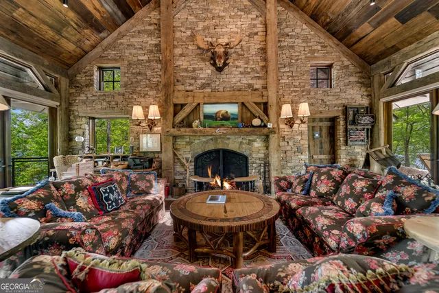 a bedroom with furniture and a book shelf
