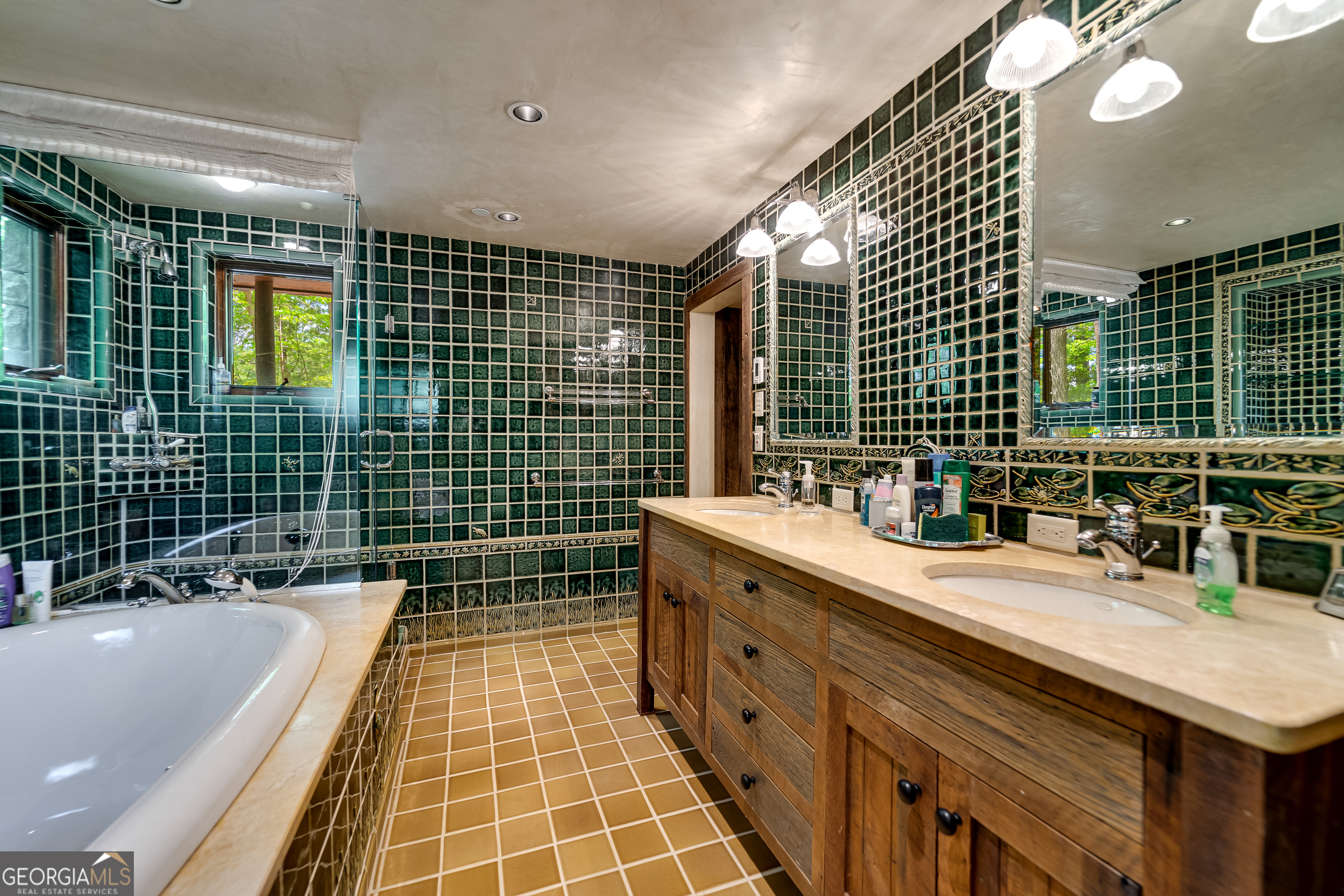 1 Burton Island Tiger, GA 30576 - Photo 61 of 98 a bathroom with a double vanity sink a mirror and a bathtub