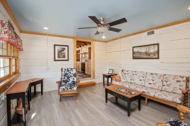 a view of an entryway with wooden floor